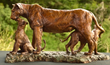 Maternal Instinct - Lioness and cubs