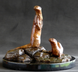 Spotted Necked otters maquette