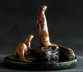 Spotted Necked otters maquette