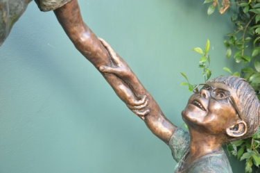 Helping hands - Boys climbing