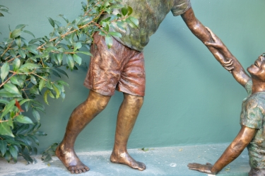 Helping hands - Boys climbing 